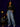 Lady Q’s Corner black cropped blazer with gold embroidery, worn by a model with cargo jeans and a baseball cap.