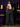 Lady Q’s Corner black high-waisted wide-leg cargo pants with side pockets worn by a woman in a white crop top
