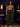 Lady Q’s Corner black high-waisted wide-leg cargo pants with side pockets worn by a woman with a brown tank top