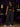 Lady Q’s Corner black high-waisted wide-leg trousers with elastic waistband and pockets worn with a black crop top