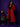 Lady Q’s Corner crimson red wool-blend longline trench coat with black velvet lapels and cuffs on a model.