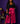 Lady Q’s Corner magenta high-waisted satin wide-leg trousers worn by a woman with a black blazer and heels.