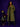 Lady Q’s Corner olive green longline trench coat with double-breasted buttons worn by a woman against a purple wall