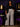 Lady Q’s Corner high-waisted wide-leg plaid trousers in white with red, black, and green tartan, worn with a blazer.