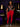 Lady Q’s Corner red high-waisted leggings worn by a woman with a graphic t-shirt, sneakers, and a quilted handbag.
