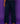 Lady Q’s Corner high-waisted wide-leg indigo denim trousers with architectural panel stitching on a purple background